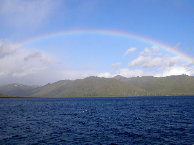 The top of the bow of a rainbow seen at Dutch Harbor