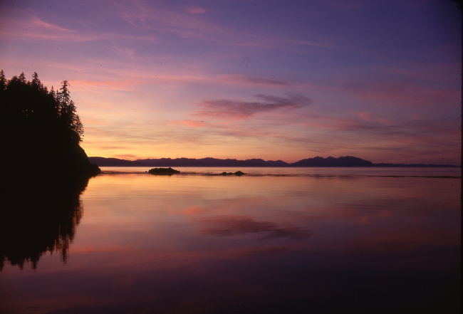 A glorious Alaska sunset over a quiet cove