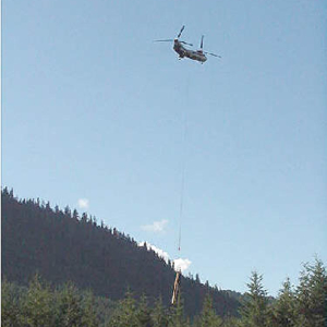 A Boeing Verto 107 helicopter was used to lift logs into place in the stream