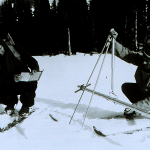 Forest Service employees measuring snow depth