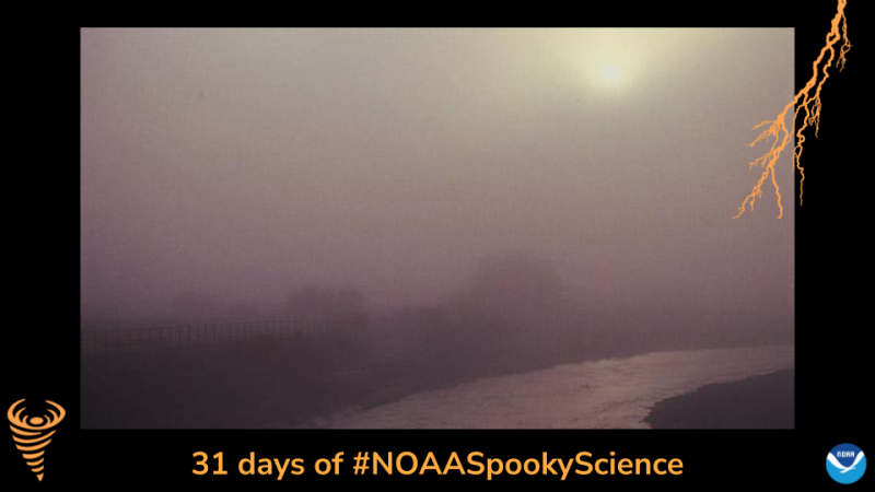 A foggy area with the sun breaking through. Border of the photo is black with orange atmospheric graphics of a lightning bolt and a tornado. Text: 31 days of #NOAASpookyScience