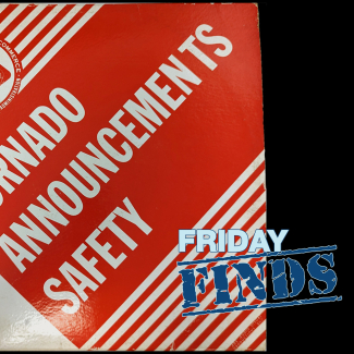 Photo of the Tornado Safety Announcements record cover. The cover reads, "TORNADO SAFETY ANNOUNCEMENTS" on a red background. It has diagonal red and white lines covering the upper left and lower right corners and the ESSA logo in the upper left.